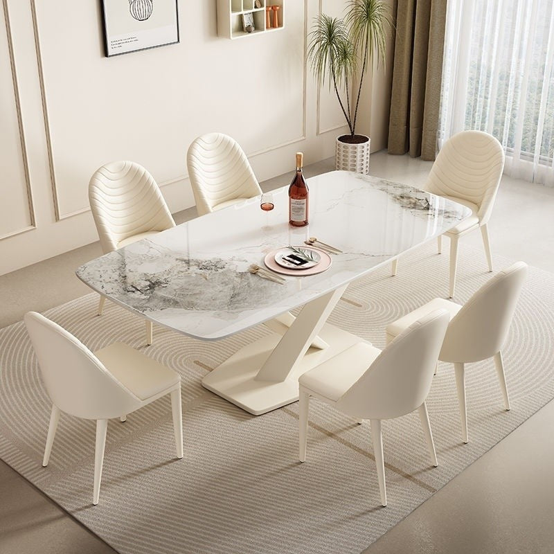 Modern dining set with table chairs and matching cream-white stone style – ideal for home use.